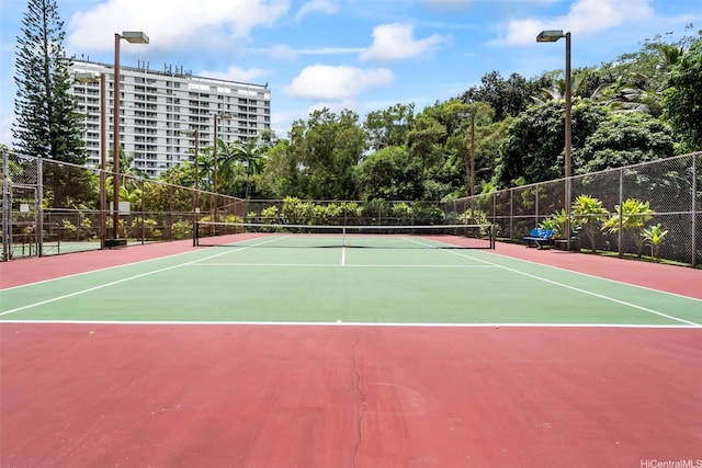 view of sport court featuring fence and community basketball court