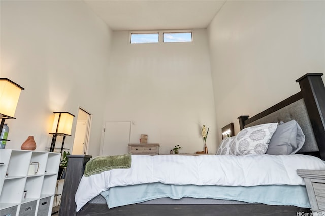 bedroom with a towering ceiling