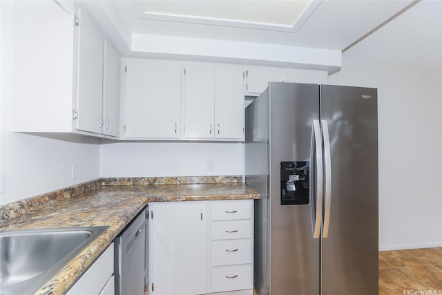 46-318 Haiku Rd Unit 70, Kaneohe, HI 96744 - kitchen with appliances with stainless steel finishes, white cabinets, and dark countertops