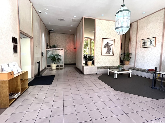 411 Hobron Ln Unit 903, Honolulu, HI 96815 - building lobby with wallpapered walls, a security system, and recessed lighting