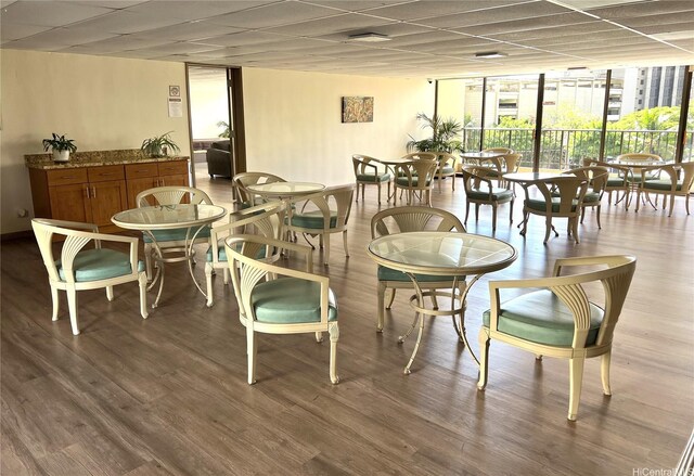 411 Hobron Ln Unit 903, Honolulu, HI 96815 - dining area featuring floor to ceiling windows and wood finished floors