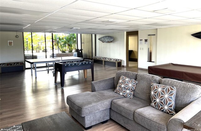 411 Hobron Ln Unit 903, Honolulu, HI 96815 - rec room featuring expansive windows, a paneled ceiling, and wood finished floors