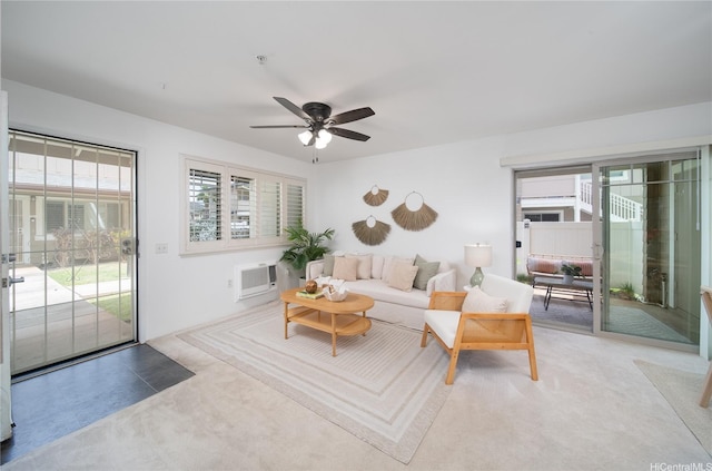 91-1039 Kamaaha Ave Unit 1505, Kapolei, HI 96707 - living room with healthy amount of natural light, a wall unit AC, a ceiling fan, and light colored carpet