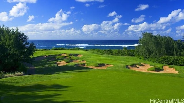 view of home's community featuring a water view and golf course view