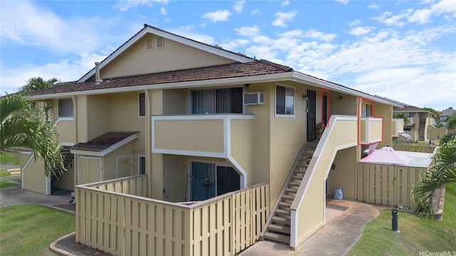 94-1016 Kaukahi Pl Unit J8, Waipahu, HI 96797 - back of property with stairway and a wall unit AC