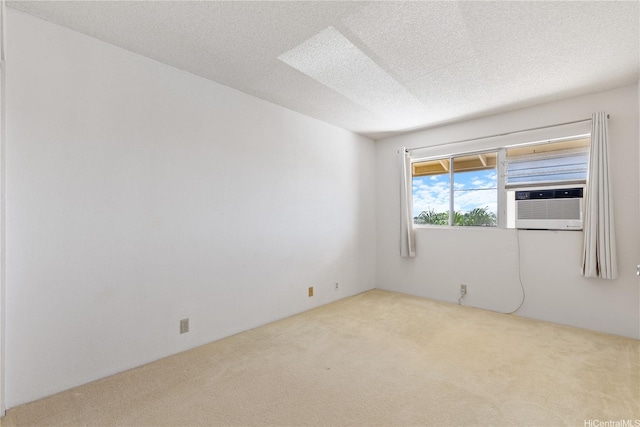 94-1016 Kaukahi Pl Unit J8, Waipahu, HI 96797 - empty room featuring carpet flooring, a textured ceiling, and cooling unit