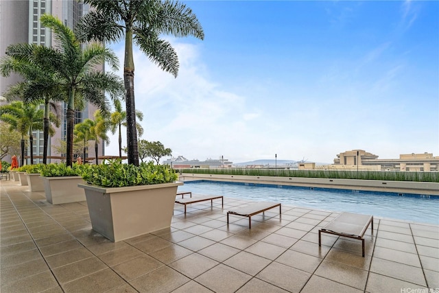 pool featuring a patio area