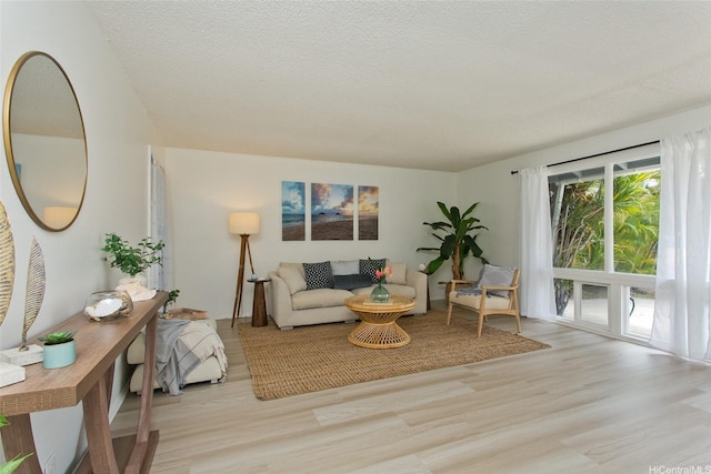 1334 Kuuna St, Kailua, HI 96734 - living room featuring wood finished floors and a textured ceiling