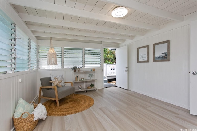 1334 Kuuna St, Kailua, HI 96734 - living area with light wood-type flooring, beamed ceiling, wood ceiling, baseboards, and wood walls