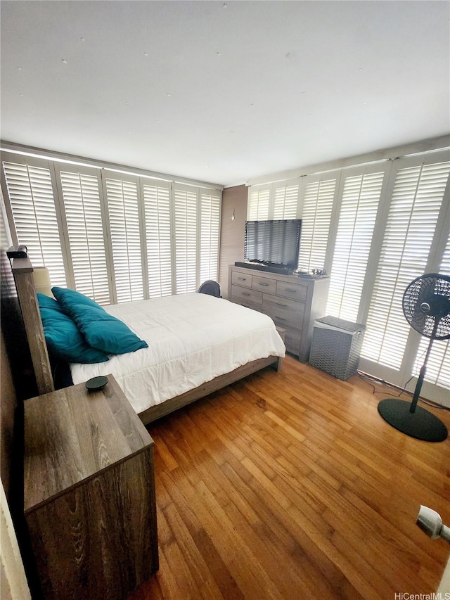 bedroom featuring wood finished floors
