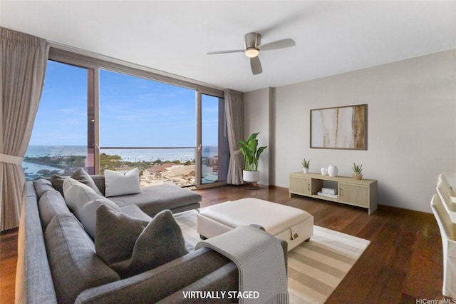 1555 Kapiolani Blvd Unit 1800, Honolulu, HI 96814 - living room featuring expansive windows, a water view, ceiling fan, and wood finished floors