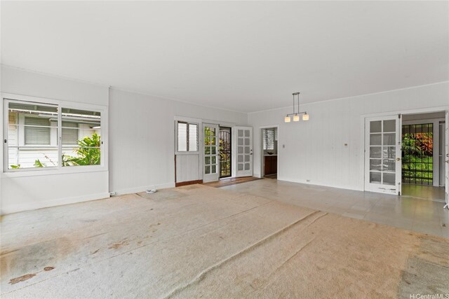 3251 Oahu Ave, Honolulu, HI 96822 - unfurnished room featuring french doors, baseboards, and carpet