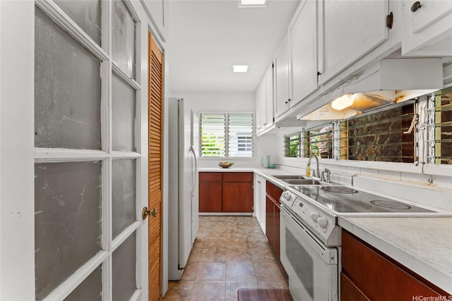 3251 Oahu Ave, Honolulu, HI 96822 - kitchen featuring white appliances, a sink, light countertops, and white cabinetry