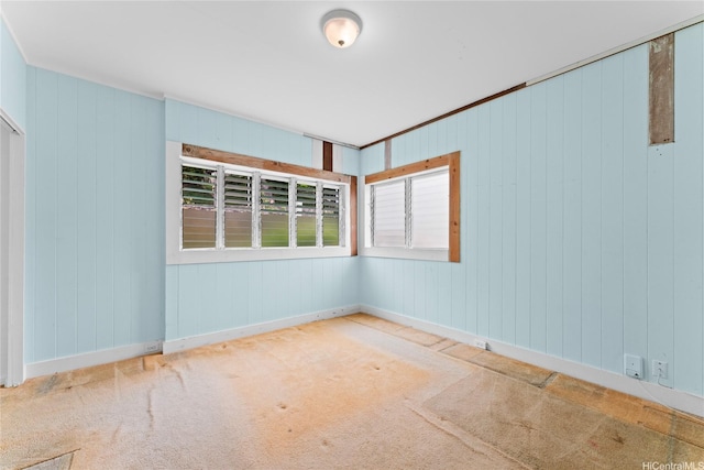 3251 Oahu Ave, Honolulu, HI 96822 - carpeted empty room with baseboards and wood walls