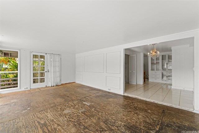 3251 Oahu Ave, Honolulu, HI 96822 - spare room with a chandelier and a decorative wall