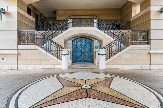 1740 S Beretania St Unit 9, Honolulu, HI 96826 - entryway with stairs, inlaid floor details, and a high ceiling