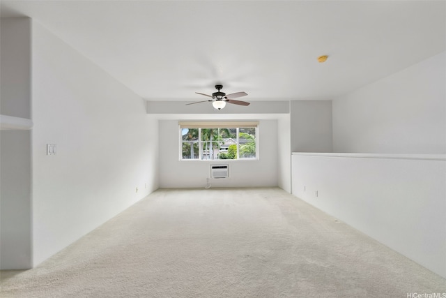 7188 Hawaii Kai Dr Unit 244, Honolulu, HI 96825 - carpeted empty room with a wall mounted AC and ceiling fan