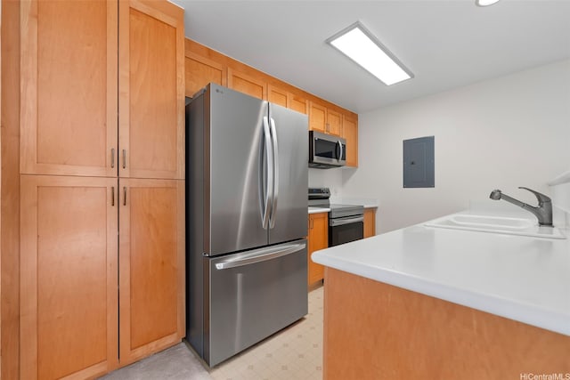7188 Hawaii Kai Dr Unit 244, Honolulu, HI 96825 - kitchen featuring a sink, electric panel, light floors, stainless steel appliances, and light countertops