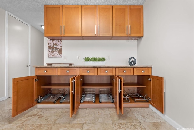 2920 Ala Ilima St Unit 1003, Honolulu, HI 96818 - office space featuring baseboards and a textured ceiling
