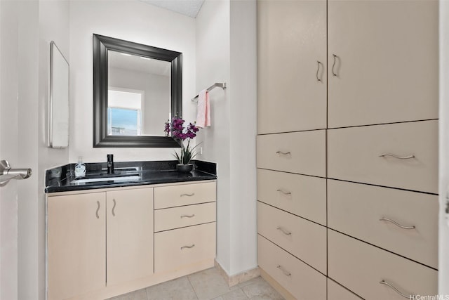 2920 Ala Ilima St Unit 1003, Honolulu, HI 96818 - bathroom with vanity, tile patterned flooring, and baseboards