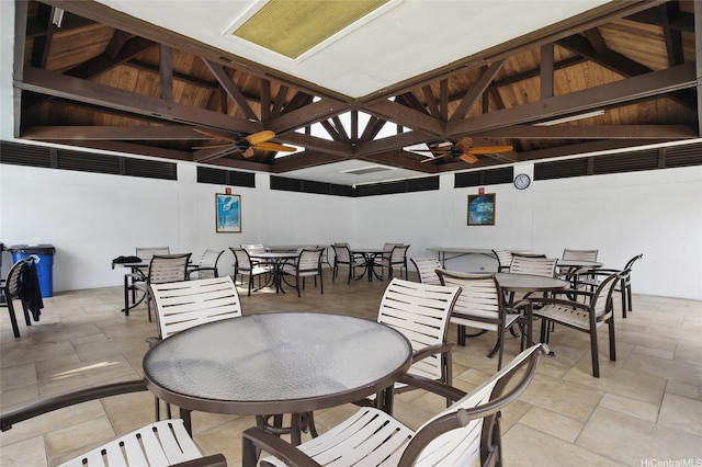 view of patio / terrace with ceiling fan, a gazebo, and outdoor dining area