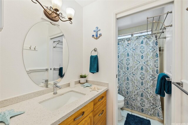 full bath featuring vanity, tile patterned flooring, a shower with curtain, and toilet