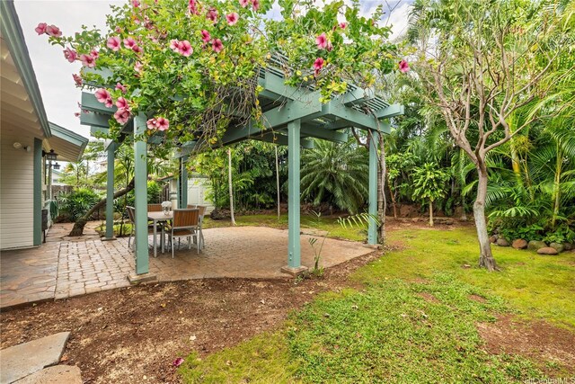 view of yard with a patio, a fenced backyard, and a pergola
