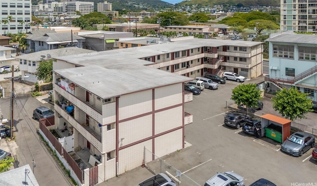 birds eye view of property with a mountain view