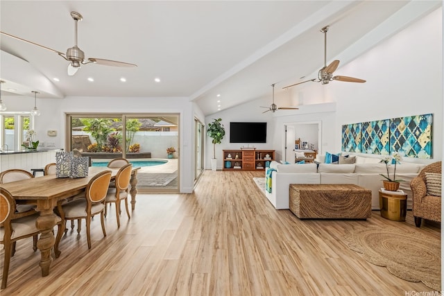 living room with vaulted ceiling, recessed lighting, ceiling fan, and light wood-style flooring