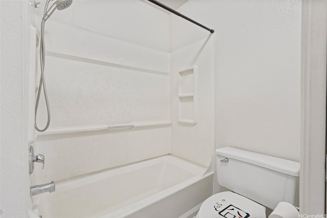bathroom with toilet and shower / bathtub combination