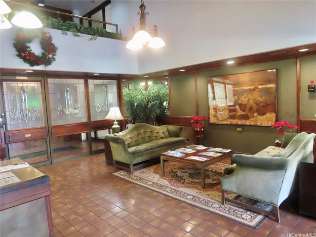 555 Hahaione St Unit 12D, Honolulu, HI 96825 - living room with a high ceiling and tile patterned floors