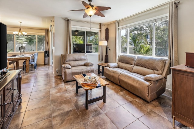 91-1154 Pekau St, Ewa Beach, HI 96706 - living room with a chandelier and ceiling fan