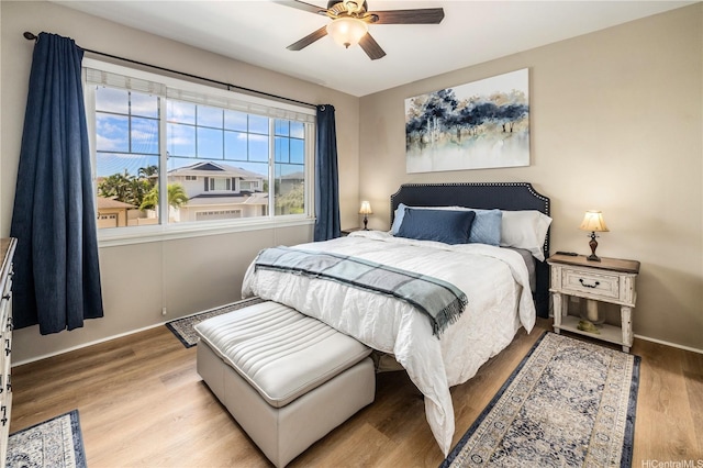 91-1154 Pekau St, Ewa Beach, HI 96706 - bedroom with light wood-style floors, baseboards, and ceiling fan