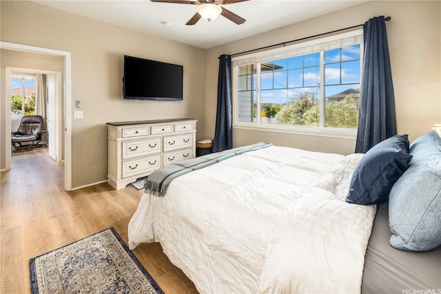 91-1154 Pekau St, Ewa Beach, HI 96706 - bedroom featuring light wood finished floors, baseboards, and a ceiling fan