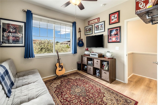 91-1154 Pekau St, Ewa Beach, HI 96706 - living area with wood finished floors, ceiling fan, and baseboards