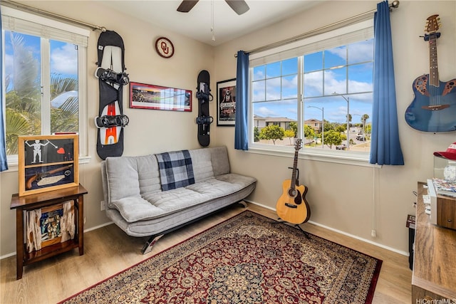 91-1154 Pekau St, Ewa Beach, HI 96706 - sitting room featuring wood finished floors, baseboards, and ceiling fan