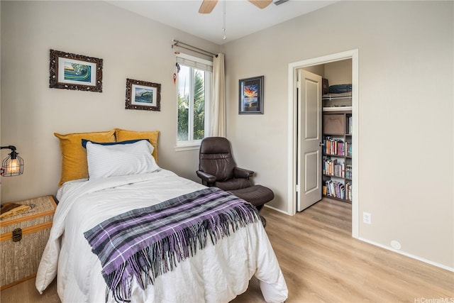 91-1154 Pekau St, Ewa Beach, HI 96706 - bedroom featuring light wood-type flooring, baseboards, and a ceiling fan