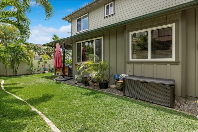 91-1154 Pekau St, Ewa Beach, HI 96706 - rear view of house with board and batten siding