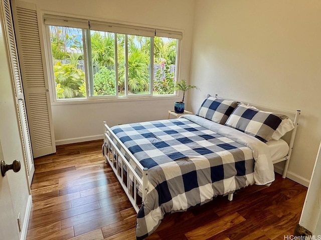 248 Aikane St, Kailua, HI 96734 - bedroom featuring multiple windows and hardwood / wood-style floors