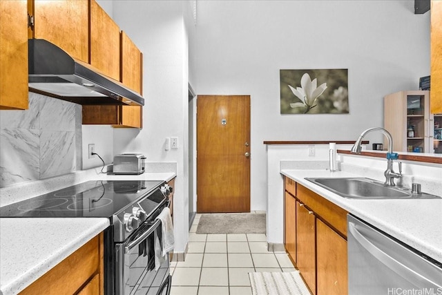 46-020 Aliikane Pl Unit 325, Kaneohe, HI 96744 - kitchen featuring a sink, light countertops, under cabinet range hood, stainless steel dishwasher, and electric range