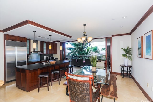 dining room with baseboards, an inviting chandelier, and ornamental molding