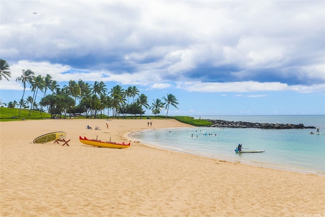 view of water feature with a beach view
