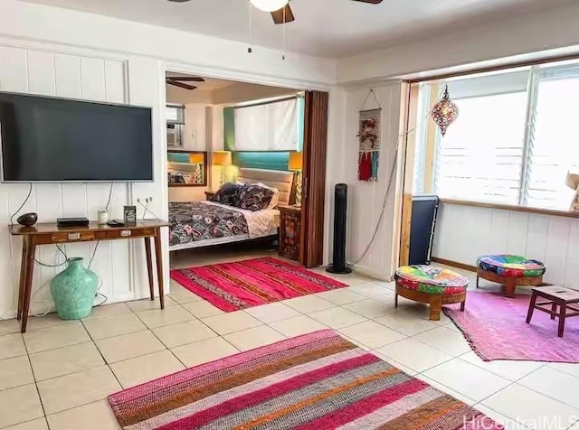 410 Nahua St Unit 212, Honolulu, HI 96815 - tiled bedroom with ceiling fan and multiple windows