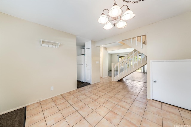 94-160 Anania Dr Unit 265, Mililani, HI 96789 - unfurnished room with stairs, a notable chandelier, and light tile patterned floors