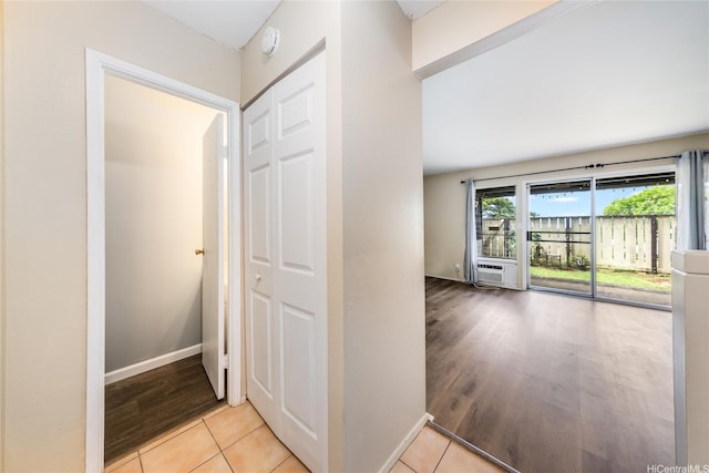 94-160 Anania Dr Unit 265, Mililani, HI 96789 - corridor with baseboards, wood finished floors, and cooling unit