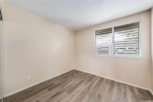 94-160 Anania Dr Unit 265, Mililani, HI 96789 - spare room with baseboards and wood finished floors