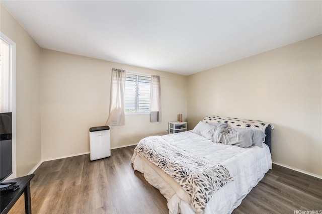 94-160 Anania Dr Unit 265, Mililani, HI 96789 - bedroom with baseboards and wood finished floors
