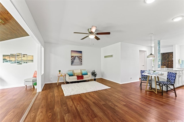 98-1790 Kaahumanu St Unit 64B, Pearl City, HI 96782 - living room with a ceiling fan, wood finished floors, and baseboards