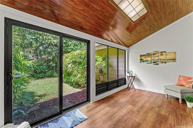 doorway with lofted ceiling, baseboards, wood finished floors, and wood ceiling