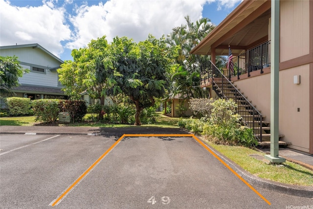 98-1790 Kaahumanu St Unit 64B, Pearl City, HI 96782 - uncovered parking lot with stairs